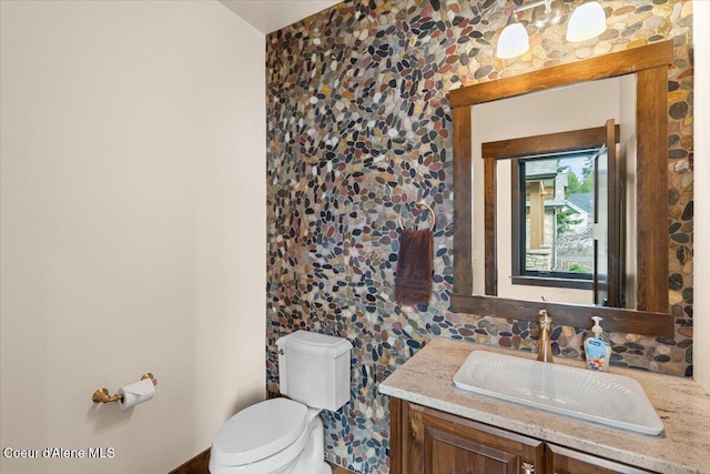 half bath with toilet and vanity