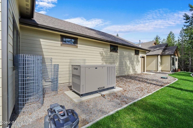 back of house featuring a yard