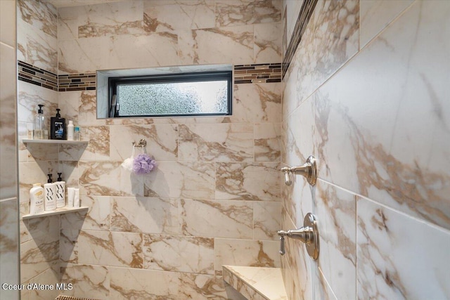 full bathroom featuring a tile shower