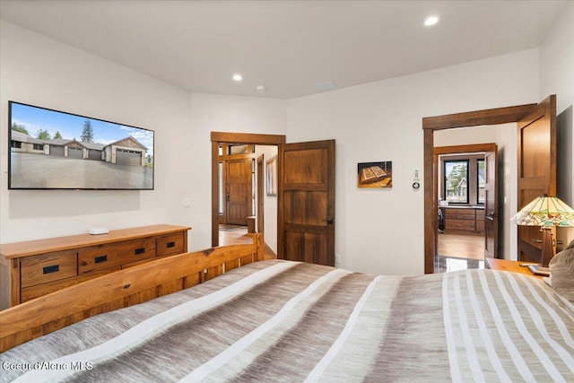 bedroom with recessed lighting
