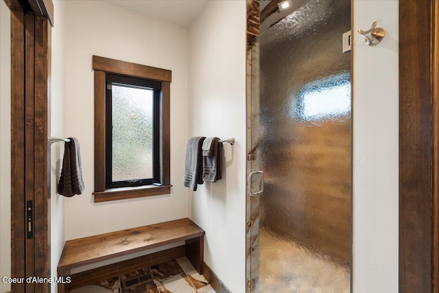 bathroom with a stall shower