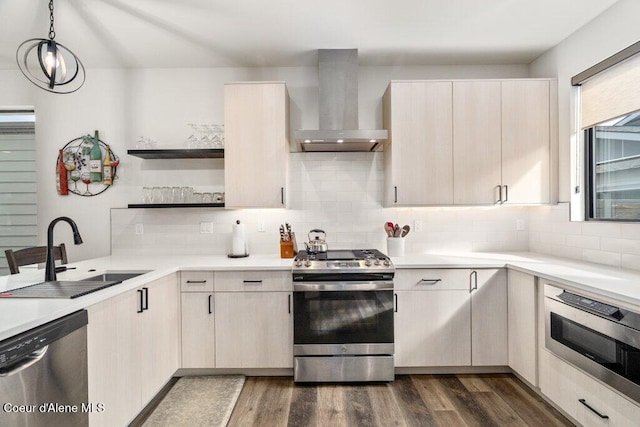 3242 N Rosalia Rd, Coeur Dalene, ID 83814 - kitchen with wall chimney range hood, open shelves, dark wood-style flooring, a sink, and stainless steel appliances