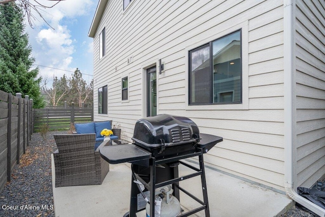 3242 N Rosalia Rd, Coeur Dalene, ID 83814 - view of patio / terrace featuring grilling area and a fenced backyard