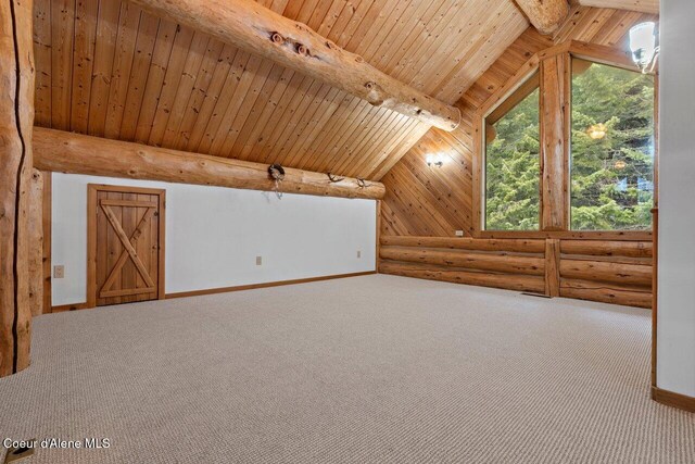 bonus room featuring rustic walls, lofted ceiling with beams, wooden ceiling, baseboards, and carpet floors