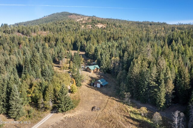 drone / aerial view with a view of trees