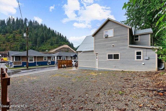 804 Residence St, Wallace, ID 83873 - view of side of property featuring metal roof