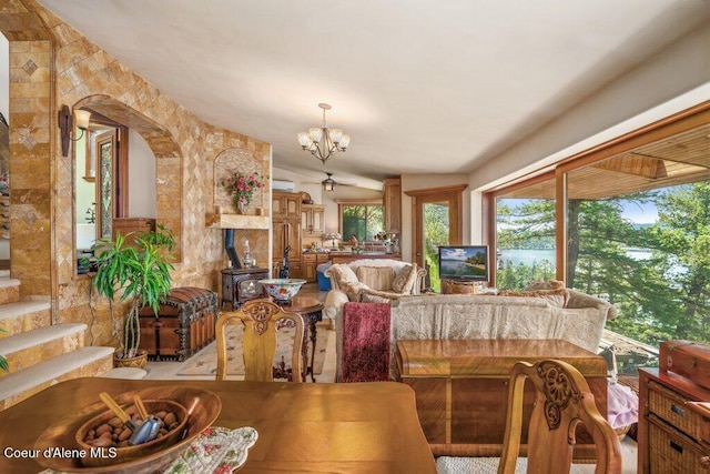 154 W Eagle Crest Dr, Sagle, ID 83860 - dining space featuring arched walkways and a chandelier