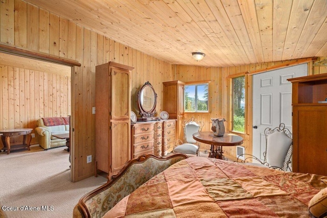 154 W Eagle Crest Dr, Sagle, ID 83860 - carpeted bedroom featuring wooden walls and wood ceiling
