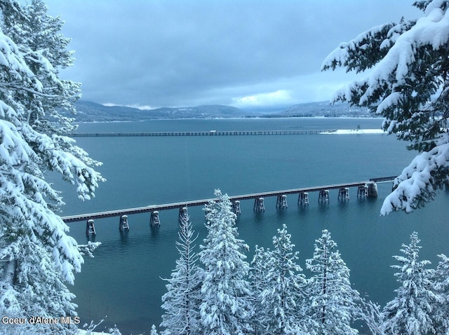 154 W Eagle Crest Dr, Sagle, ID 83860 - water view featuring a mountain backdrop and a notable bridge