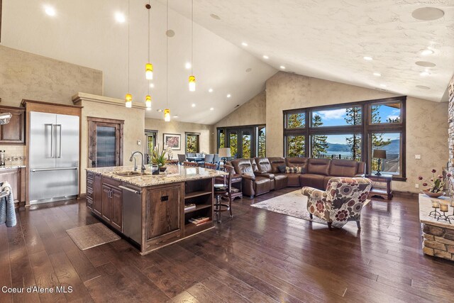 1122 S Four Winds Rd, Coeur Dalene, ID 83814 - kitchen featuring a sink, dark wood finished floors, a wealth of natural light, and stainless steel appliances