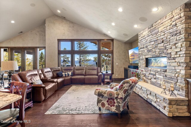1122 S Four Winds Rd, Coeur Dalene, ID 83814 - living room featuring high vaulted ceiling, recessed lighting, visible vents, and hardwood / wood-style floors