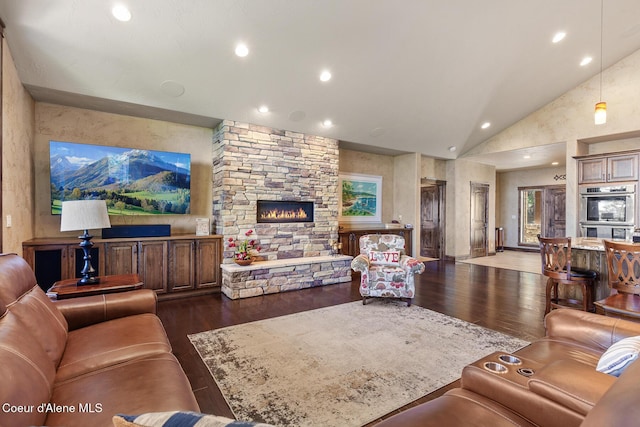 1122 S Four Winds Rd, Coeur Dalene, ID 83814 - living area with recessed lighting, high vaulted ceiling, a fireplace, and dark wood-style floors