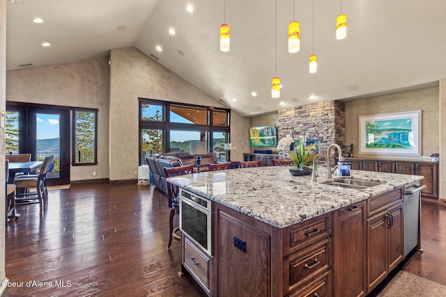 1122 S Four Winds Rd, Coeur Dalene, ID 83814 - kitchen with light stone countertops, dark wood-type flooring, open floor plan, and a sink