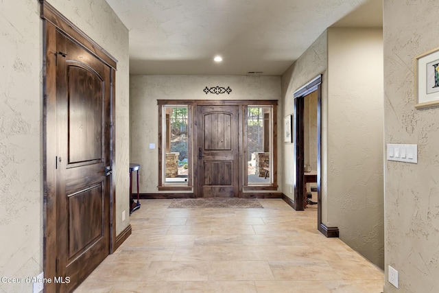 1122 S Four Winds Rd, Coeur Dalene, ID 83814 - entrance foyer featuring baseboards, recessed lighting, and a textured wall
