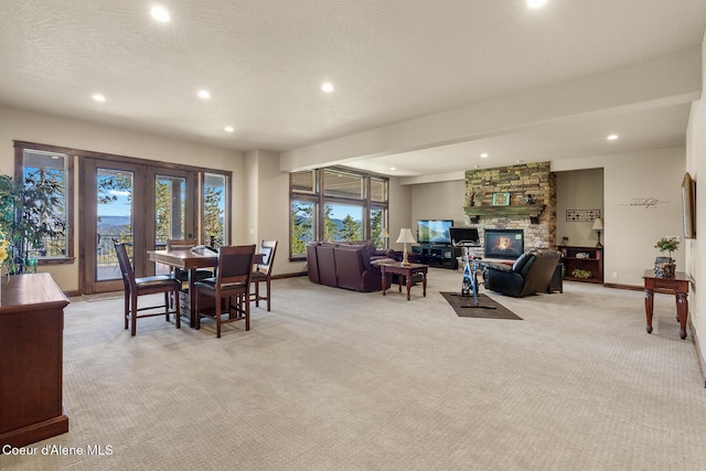 1122 S Four Winds Rd, Coeur Dalene, ID 83814 - dining room with a wealth of natural light, light colored carpet, recessed lighting, french doors, and baseboards