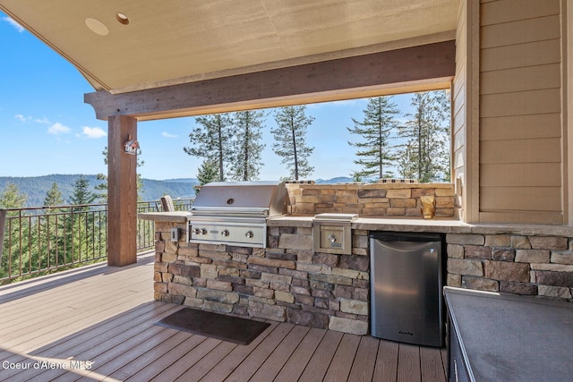 1122 S Four Winds Rd, Coeur Dalene, ID 83814 - deck featuring area for grilling and a mountain view