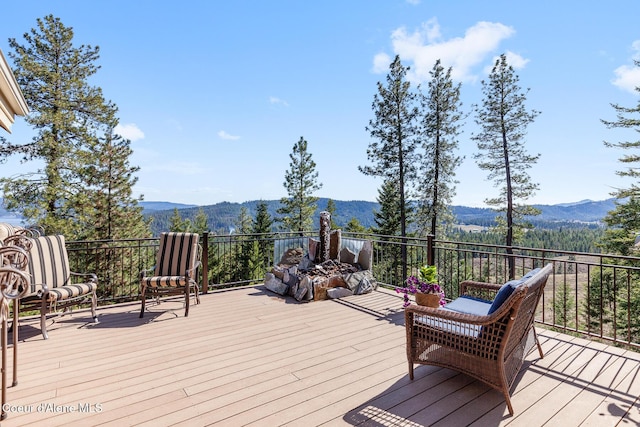 1122 S Four Winds Rd, Coeur Dalene, ID 83814 - wooden terrace with a mountain view