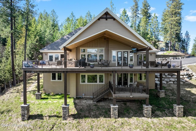 1122 S Four Winds Rd, Coeur Dalene, ID 83814 - back of property with a wooden deck