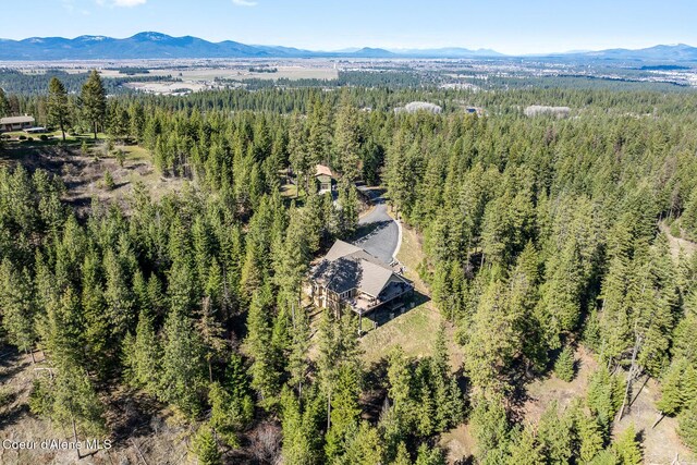1122 S Four Winds Rd, Coeur Dalene, ID 83814 - aerial view featuring a forest view and a mountain view