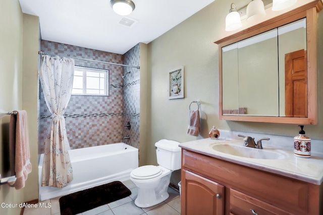234 Stoneridge Rd, Blanchard, ID 83804 - bathroom featuring shower / bath combo, visible vents, toilet, vanity, and tile patterned floors