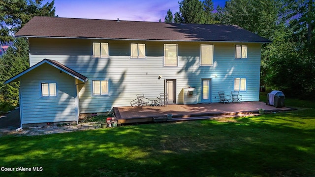 234 Stoneridge Rd, Blanchard, ID 83804 - rear view of property featuring crawl space, a wooden deck, and a lawn