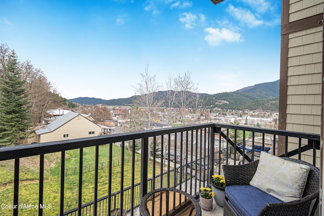 balcony featuring a mountain view
