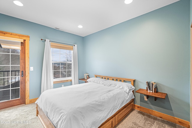 bedroom featuring light carpet, recessed lighting, visible vents, and baseboards