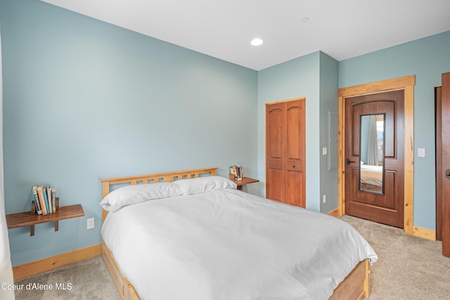carpeted bedroom with recessed lighting and baseboards