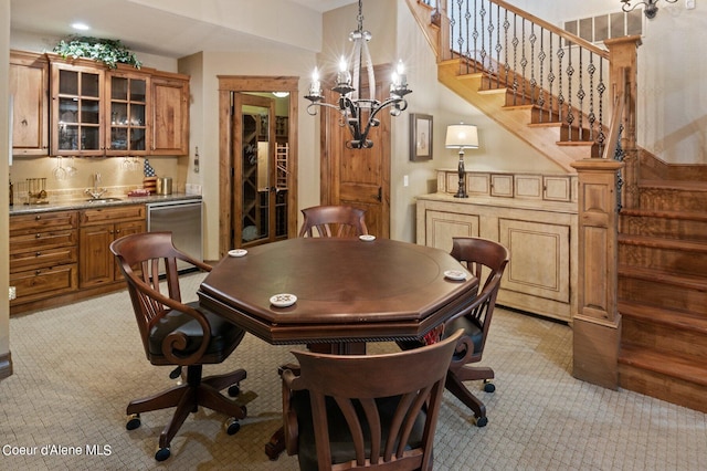 16917 S Basalt Dr, Coeur Dalene, ID 83814 - dining area with wet bar, light carpet, stairs, and a chandelier