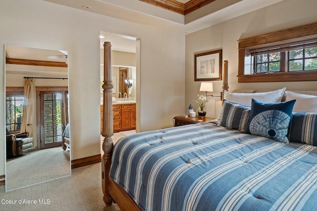 16917 S Basalt Dr, Coeur Dalene, ID 83814 - bedroom featuring crown molding, access to outside, light carpet, ensuite bath, and a tray ceiling