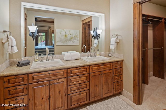16917 S Basalt Dr, Coeur Dalene, ID 83814 - bathroom with double vanity and tile patterned flooring