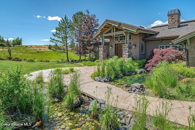16917 S Basalt Dr, Coeur Dalene, ID 83814 - view of front of property with a chimney