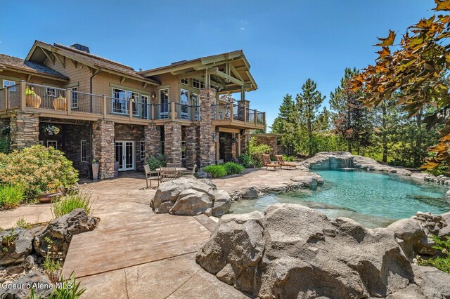 16917 S Basalt Dr, Coeur Dalene, ID 83814 - outdoor pool with a patio area