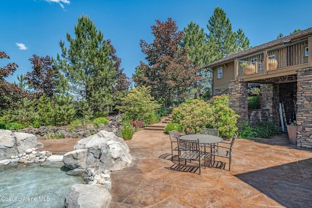 16917 S Basalt Dr, Coeur Dalene, ID 83814 - patio / terrace with a patio area, outdoor dining space, and stairs