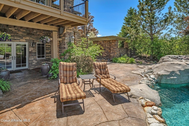 16917 S Basalt Dr, Coeur Dalene, ID 83814 - patio / terrace featuring french doors and a patio