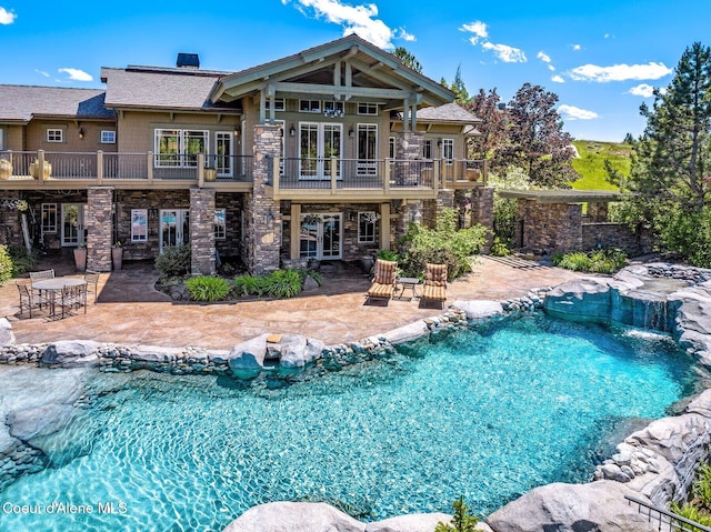 16917 S Basalt Dr, Coeur Dalene, ID 83814 - swimming pool featuring a patio