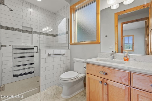 full bathroom with a shower stall, vanity, marble finish floor, and toilet