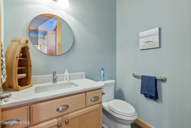 half bath with toilet and vanity