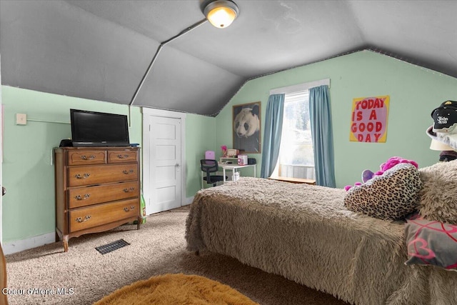 315 S 5th St, Saint Maries, ID 83861 - carpeted bedroom with baseboards and vaulted ceiling