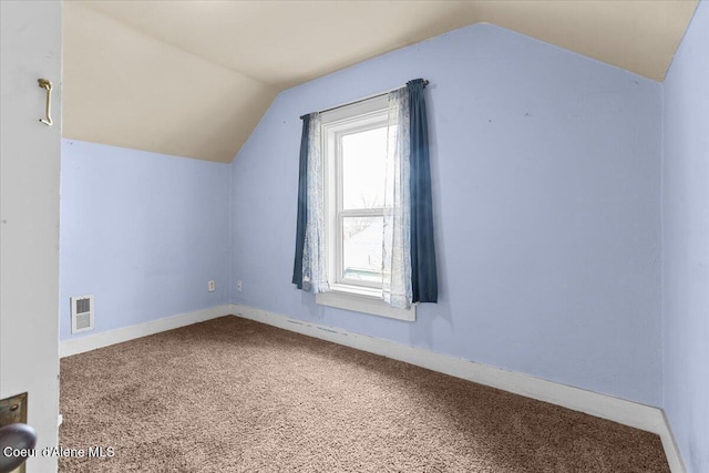 315 S 5th St, Saint Maries, ID 83861 - bonus room featuring visible vents, baseboards, carpet, and vaulted ceiling