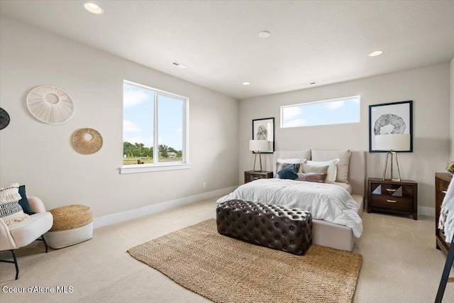 3402 N Cyprus Fox Loop, Post Falls, ID 83854 - bedroom with baseboards, recessed lighting, and light colored carpet