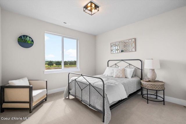 3402 N Cyprus Fox Loop, Post Falls, ID 83854 - carpeted bedroom with baseboards and visible vents