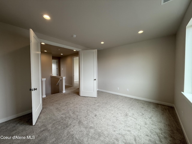 3402 N Cyprus Fox Loop, Post Falls, ID 83854 - unfurnished bedroom with carpet flooring and recessed lighting