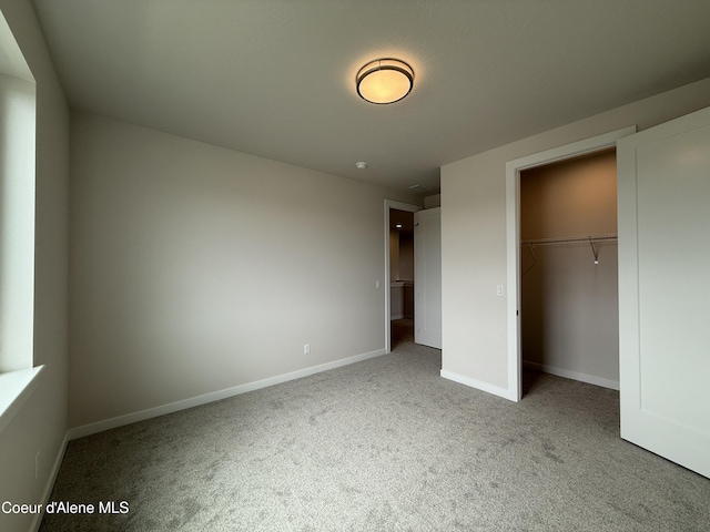 3402 N Cyprus Fox Loop, Post Falls, ID 83854 - unfurnished bedroom featuring carpet flooring and a closet