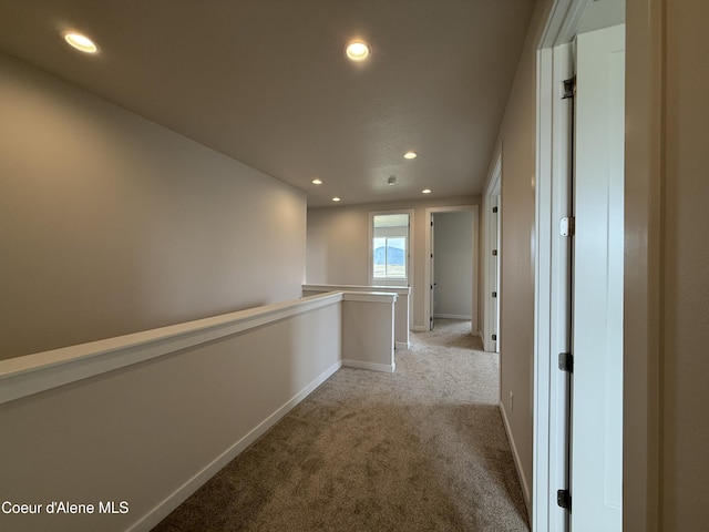 3402 N Cyprus Fox Loop, Post Falls, ID 83854 - hallway featuring recessed lighting, light colored carpet, and an upstairs landing