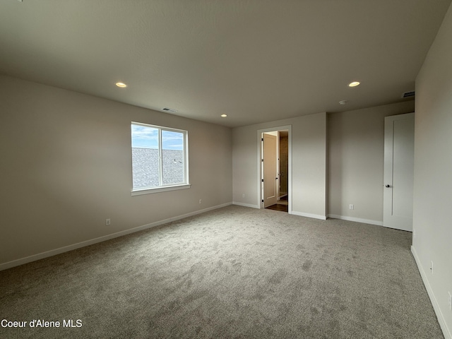 3402 N Cyprus Fox Loop, Post Falls, ID 83854 - carpeted empty room with recessed lighting