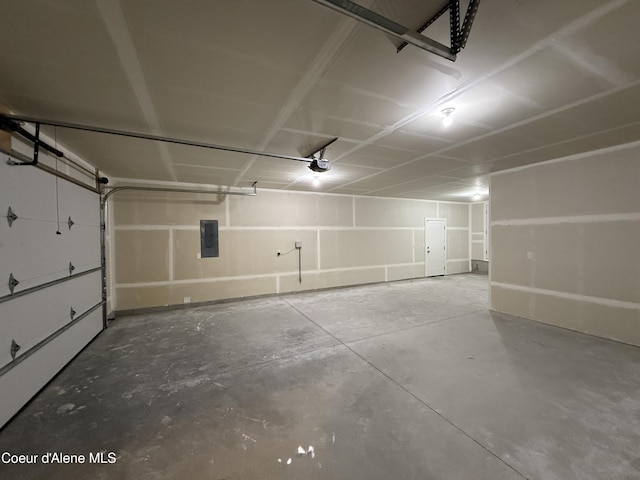3402 N Cyprus Fox Loop, Post Falls, ID 83854 - garage with electric panel and a garage door opener