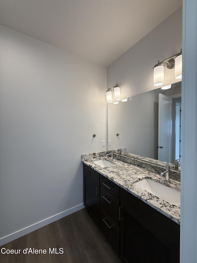 3402 N Cyprus Fox Loop, Post Falls, ID 83854 - full bath featuring wood finished floors and double vanity
