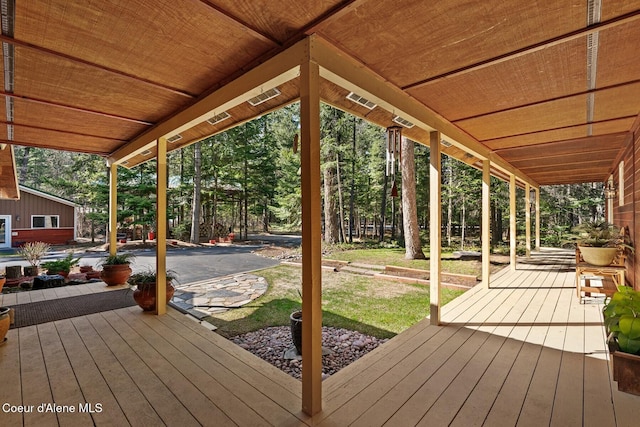 deck featuring a yard