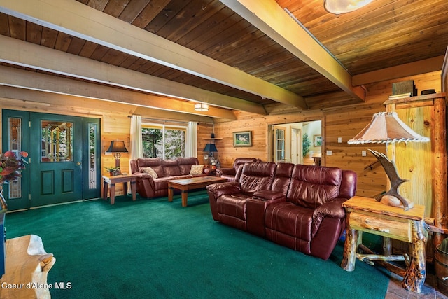 carpeted living room with wood walls, wood ceiling, and beamed ceiling